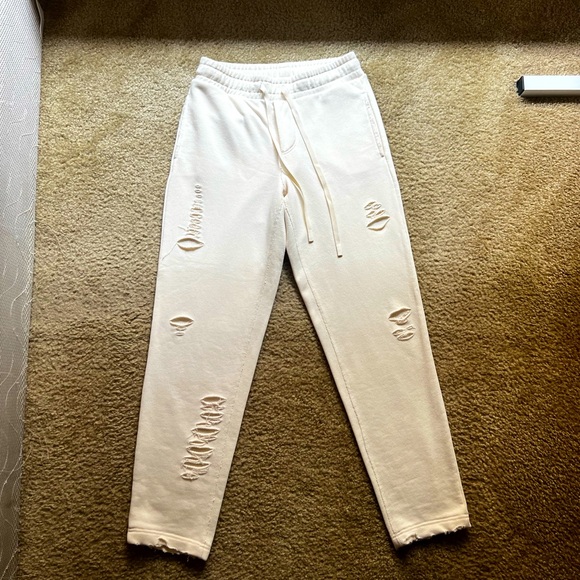 ALO YOGA DISTRESSED SWEATPANTS - Picture 1 of 9